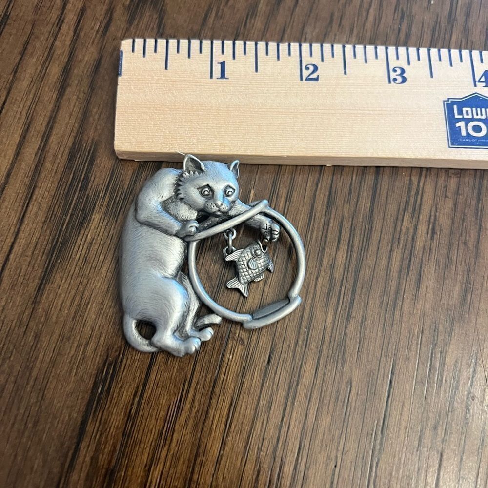 Vintage silver tone stamped JJ cat w goldfish bowl pin.